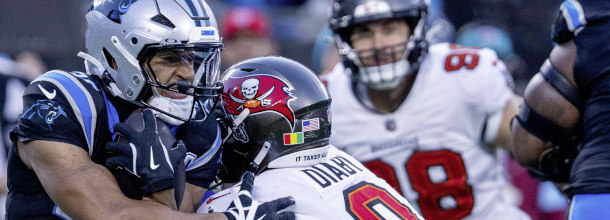 Players from the Carolina Panthers and the Tampa Bay Buccaneers in action in the NFL