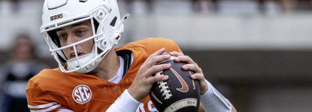 Texas Longhorns QB Arch Manning in action in an NCAAF game