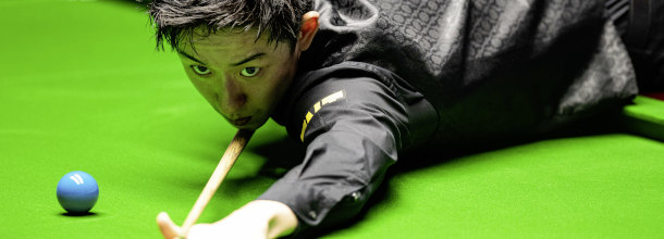 Chinese snooker star Wu Yize lines up a shot at the 2026 World Championships
